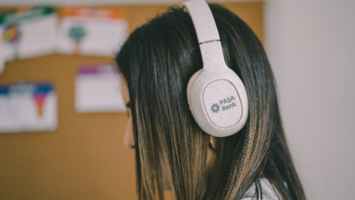 woman wearing headphones woman wearing headphones